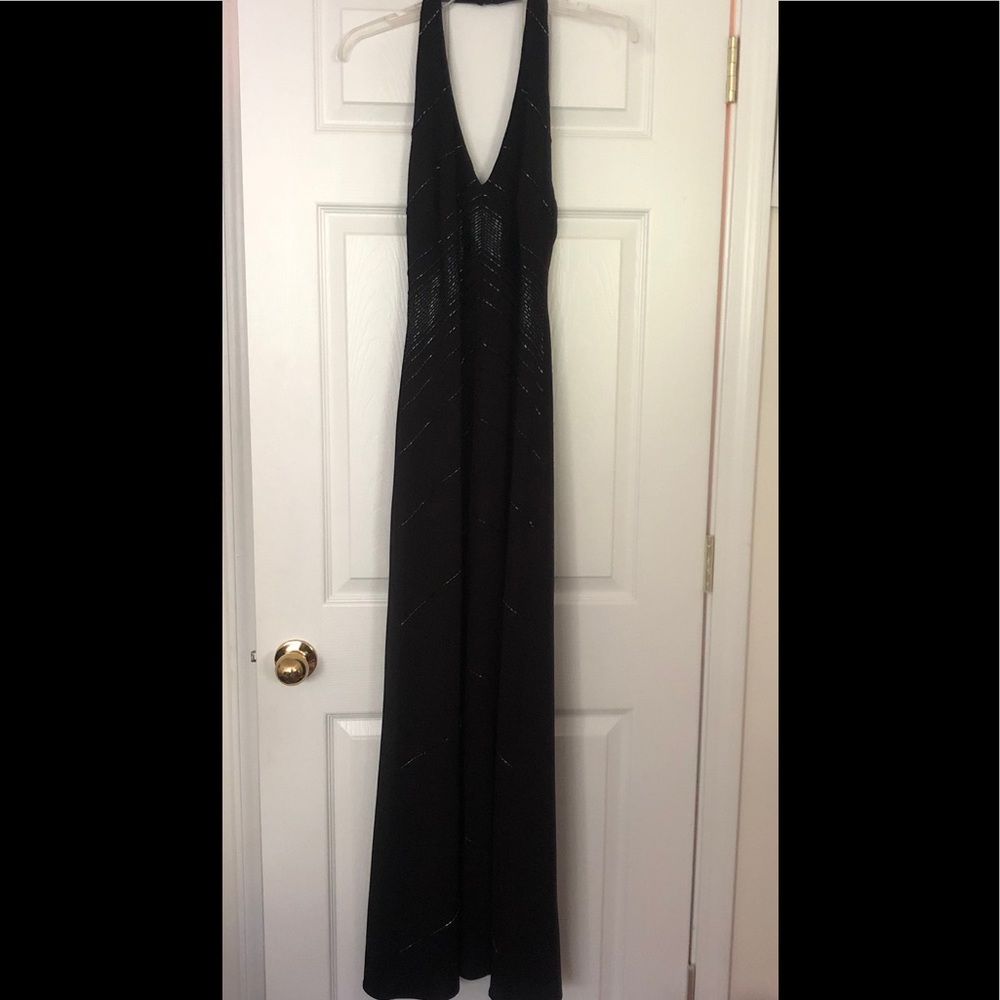 De Laru front split full length halter dress.